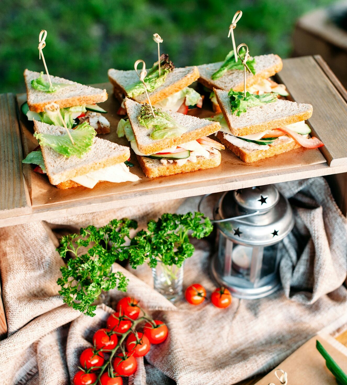 catering banquet buffet table with sandwiches and snacks